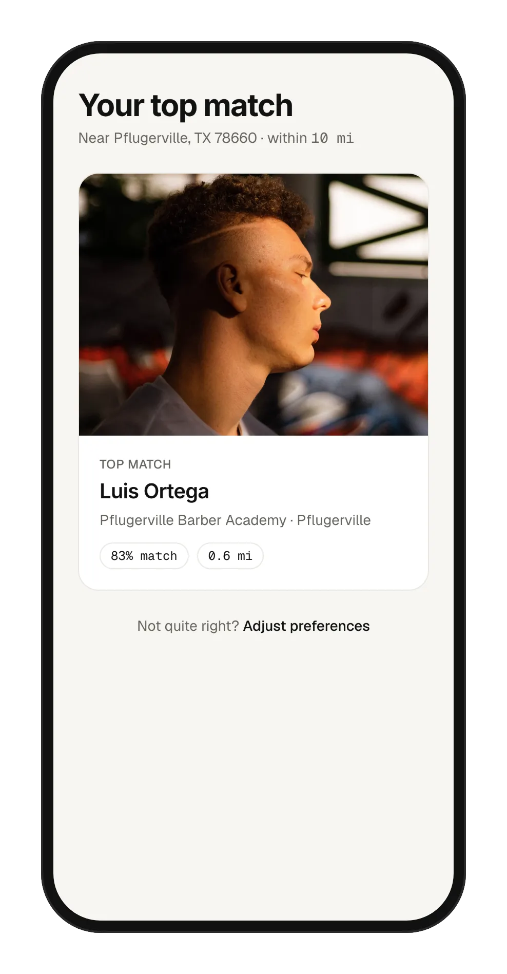 Phone view of a top-match card showing a barber and match score.